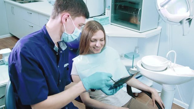 Dentist at work in dental clinic