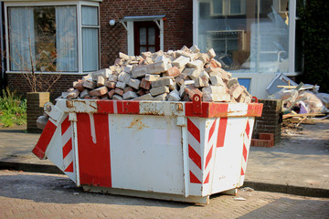 Loaded garbage dumpster