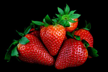 Fresh Strawberries Isolated on a Black Background