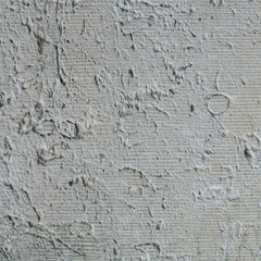 Background texture from patterns on gray-green limestone.