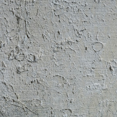 Background texture from patterns on gray-green limestone.