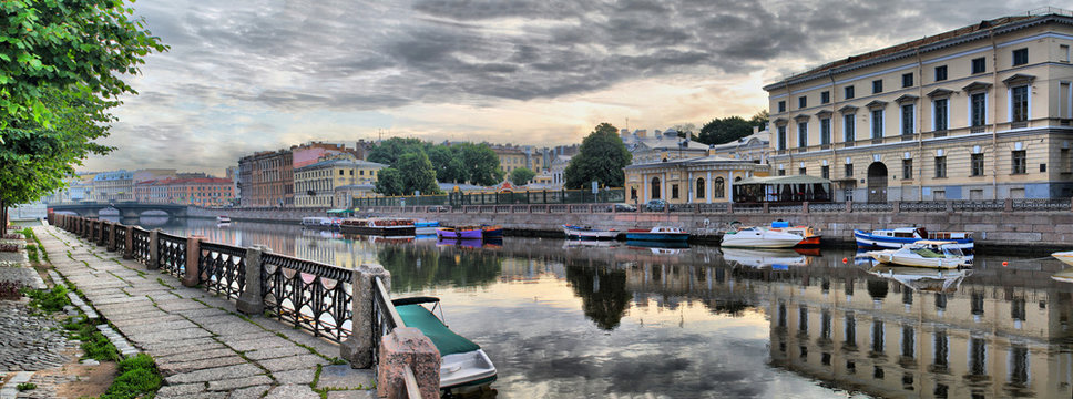 Embankment of the Fontanka river in St. Petersburg at dawn
