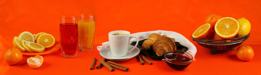Still life panorama with coffee, croissants and juice