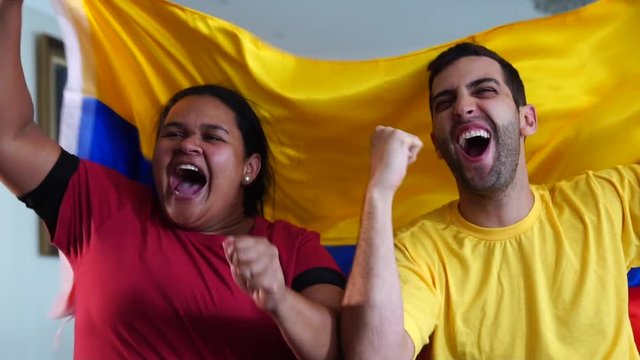 Colombian Friends Celebrating with National Flag