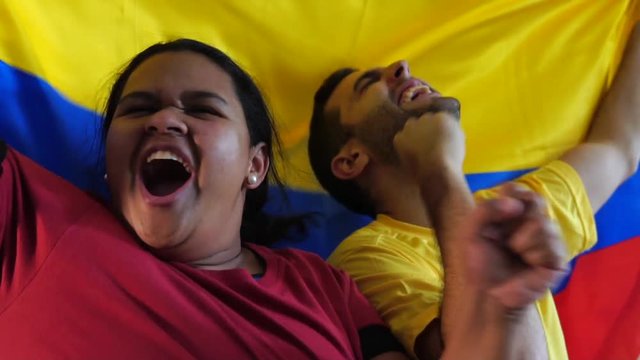 Colombian Friends Celebrating with National Flag