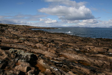 Obraz premium Coastline at Tarbat Ness Lighthouse, Scottish Highlands, Dornach Firth, Scotland