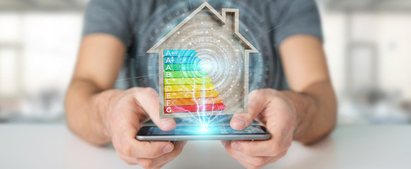 Businessman using 3D rendering energy rating chart in a wooden house