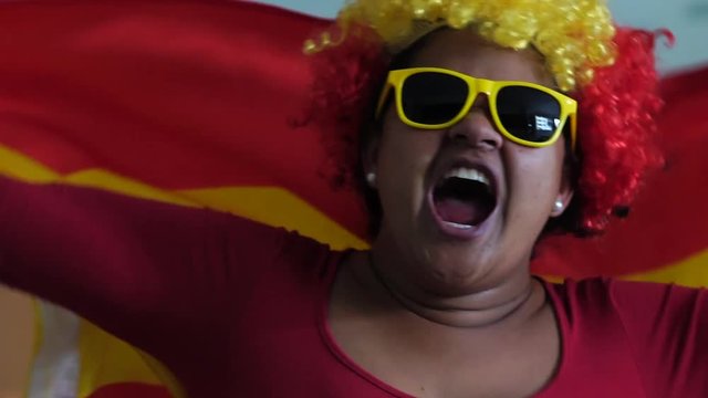 Spanish Woman Celebrating with National Flag