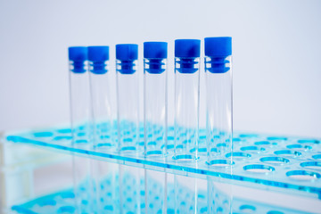 Laboratory pipette, science laboratory, doctor, science research concept,  test tube on blue background