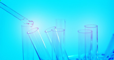 Laboratory pipette, science laboratory, doctor, science research concept,  test tube on blue background