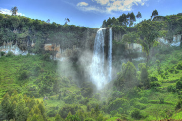 Tropical Waterfall In Uganda, Africa