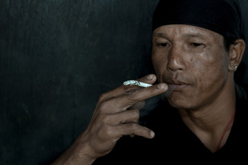 Man sitting smoking, Stop Smoking Concept, Addiction concept