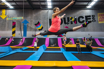 Bounce spit on trampoline - obrazy, fototapety, plakaty