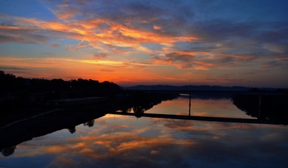 Sunrise reflections on river