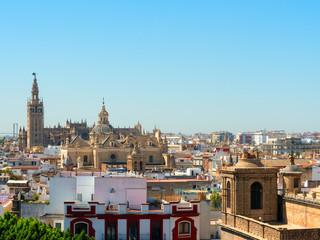 Fototapeta premium The skyline of downtown Seville, beautiful view of the El Divino Salvador Church and Catedral de Sevilla