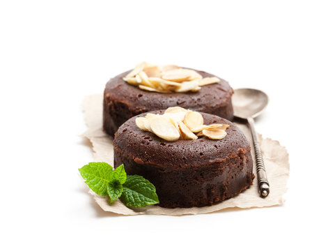 Chocolate  fondant with almonds isolated on white