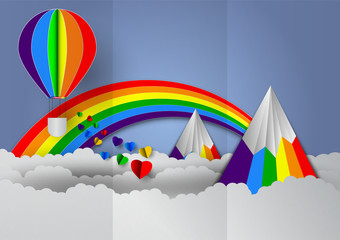 Paper cut heart shape with rainbow and balloons rainbow colors for LGBT or GLBT pride, or lesbian, gay, bisexual, transgender, on blue background