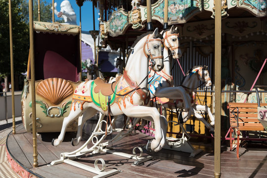 White horses of the antique carousel