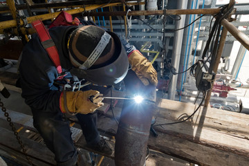 Welding works at installation of new pipeline