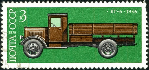 Ukraine - circa 2018: A postage stamp printed in USSR show Soviet truck YAG-6. 1936. Series:...