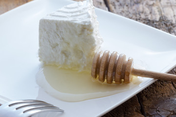 Tasty fresh cow Ricotta cheese with honey