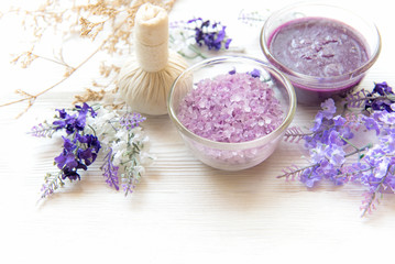 Fototapeta na wymiar Purple Lavender aromatherapy Spa with salt and treatment for body. Thai Spa relax massage. Healthy Concept. select and soft focus