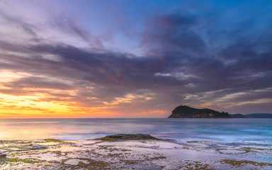Soft Dawn Seascape with Clouds and Island