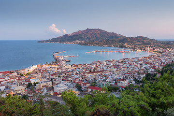 Aerial view of Zakynthos (Zante) town at sunset. Beautiful cityscape panorama of Greece city. Traveling concept background.