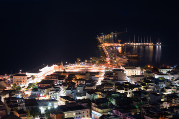 Aerial night view of Zakynthos (Zante) town. Beautiful cityscape panorama of Greece city. Traveling concept background.