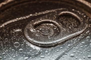Water droplets on top of the aluminum can. Macro.