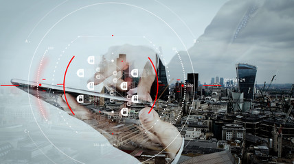 Double exposure of businessman working with new modern computer show social network structure as...