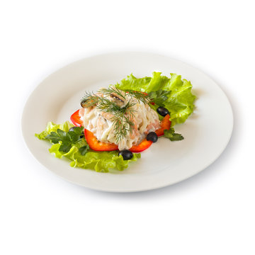 Seafood salad on a white plate. Isolated
