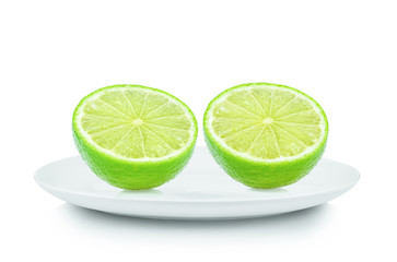 Piece lemon in white plate on white background