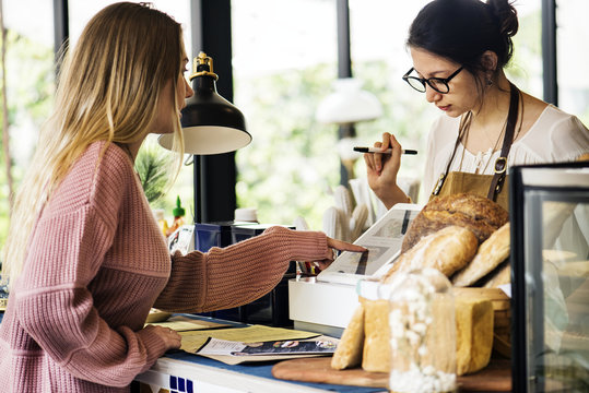 Customer Ordering Pasrty At Counter