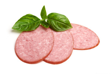 Salami smoked sausage slices, isolated on white background.