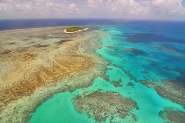 Fototapeta na wymiar Aerial view of Great Barrier Reef and Green Island from helicopter, Queensland, Australia.