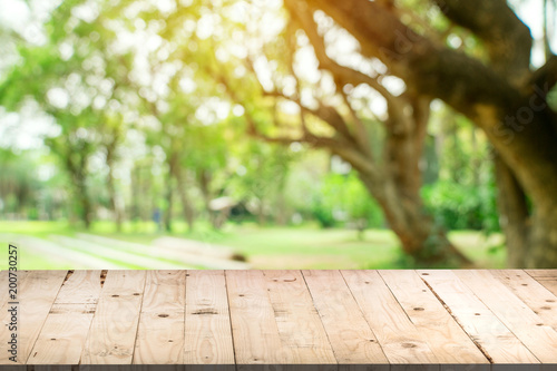 Empty Wood Table And Defocused Bokeh And Blur Background Of