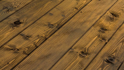 Wooden floor with a yellow shade