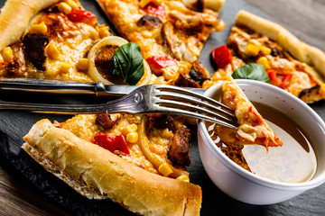 Pizza with chicken and vegetables on white background