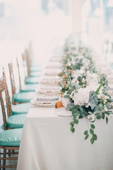 Wedding table decor in white green tones