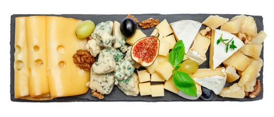 various types of cheese on stone board
