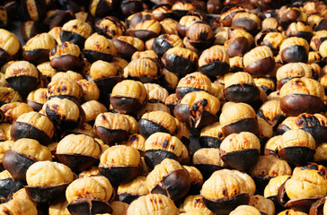 Grilled chestnuts for sale on street