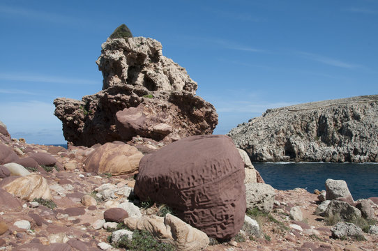 Rocks of curious shapes in Cala Morell, Menorca, Balearic Islands, Spain