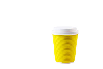 Bright yellow disposable safe heat resistant double walled paper take out coffee cup to go. Colorful eco-friendly cardboard mug for hot beverages, white cap. Isolated background, close up, copy space.