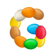 The letter G of the English alphabet is made up of colorful eggs. Isolated. White background. Education