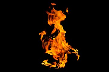 Fire flames on black background. Fire is the oxidation of the material rapidly in the exothermic...