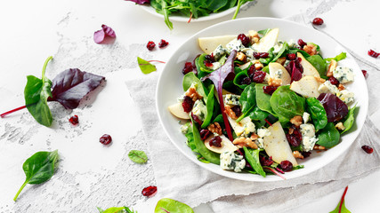 Fresh Pears, Blue Cheese salad with vegetable green mix, walnuts, cranberry. healthy food