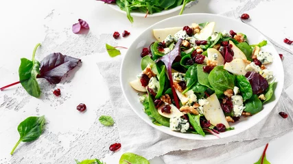 Poster Fresh Pears, Blue Cheese salad with vegetable green mix, walnuts, cranberry. healthy food © grinchh