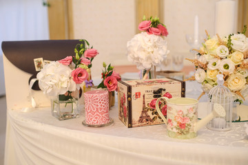 Wedding table decorated with flowers: