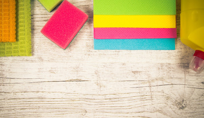 Set of cleaning up stuff on wooden background.